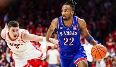Kansas Jayhawks guard Darryn Peterson (22) dribbles the ball during the first half of the game against the Arizona Wildcats at McKale Memorial Center.