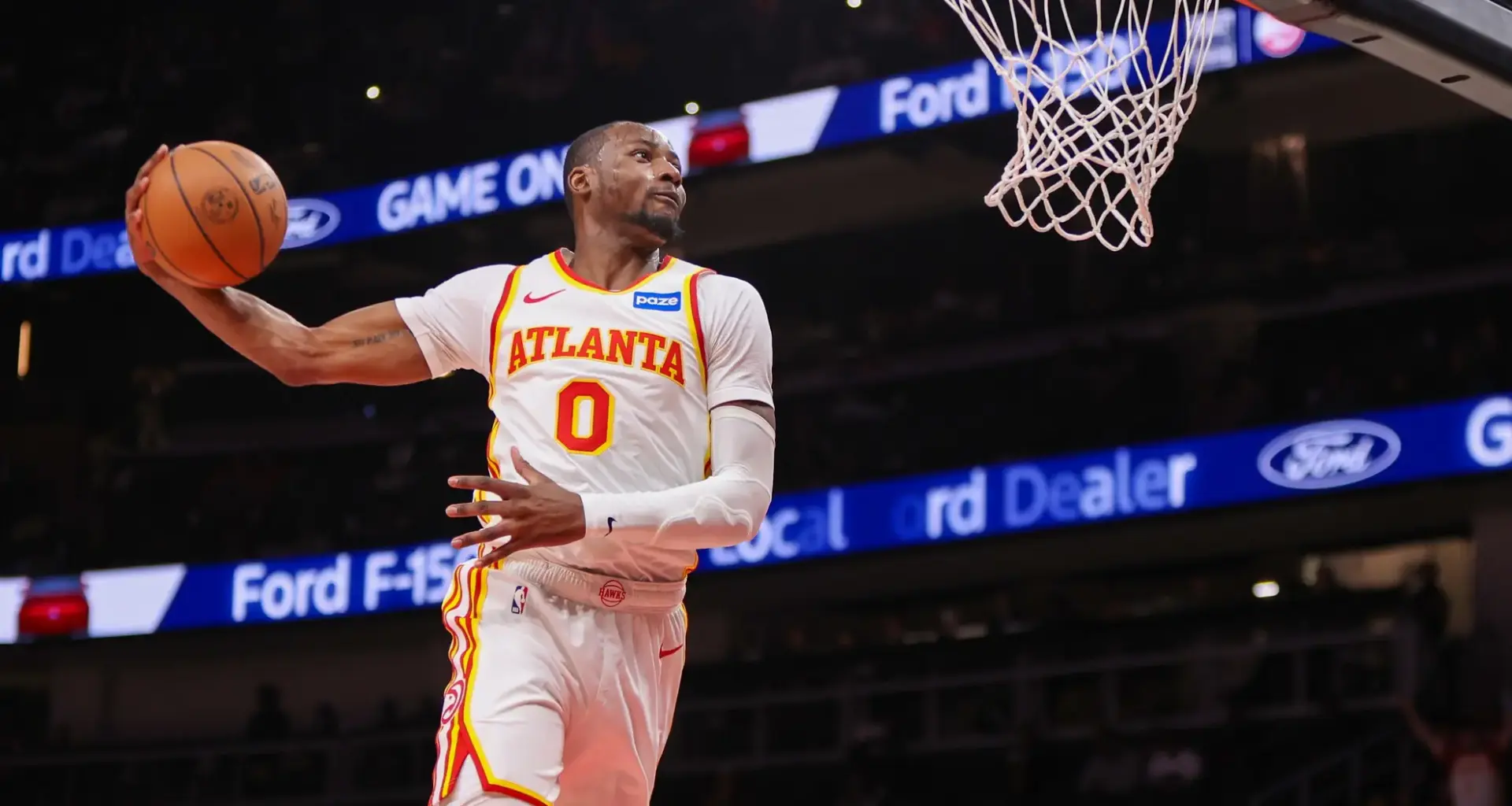 Mar 1, 2026; Atlanta, Georgia, USA; Atlanta Hawks forward Jonathan Kuminga (0) dunks against the Portland Trail Blazers in the fourth quarter at State Farm Arena. Mandatory Credit: Brett Davis-Imagn Images