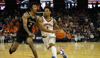 Mar 3, 2026; Charlottesville, Virginia, USA; Virginia Cavaliers guard Malik Thomas (1) drives to the basket as Wake Forest Demon Deacons forward Juke Harris (2) defends in the second half at John Paul Jones Arena.