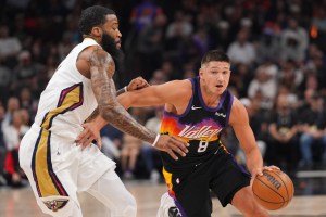 Mar 6, 2026; Phoenix, Arizona, USA; Phoenix Suns guard Grayson Allen (8) dribbles against New Orleans Pelicans guard Saddiq Bey (41) during the first half at Mortgage Matchup Center. Mandatory Credit: Joe Camporeale-Imagn Images
