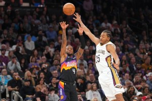 Mar 6, 2026; Phoenix, Arizona, USA; Phoenix Suns guard Jalen Green (4) shoots over New Orleans Pelicans forward Trey Murphy III (25) during the first half at Mortgage Matchup Center. Mandatory Credit: Joe Camporeale-Imagn Images