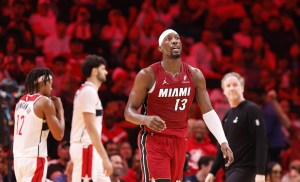 Mar 10, 2026; Miami, Florida, USA; Miami Heat center Bam Adebayo (13) walks back to the bench during a time out against the Washington Wizards during the second half at Kaseya Center. Mandatory Credit: Rhona Wise-Imagn Images