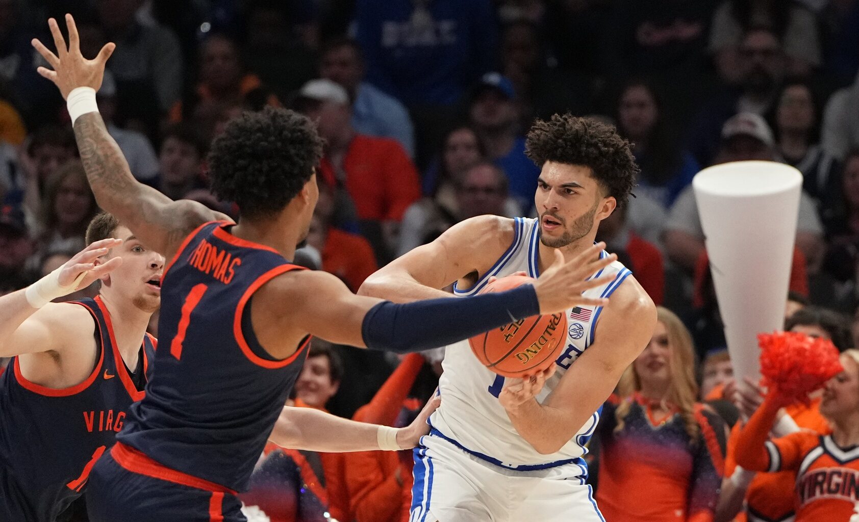 Mar 14, 2026; Charlotte, NC, USA; Duke Blue Devils forward Cameron Boozer (12) defends as Virginia Cavaliers guard Malik Thomas (1) defends in the first half during the men's ACC Conference Tournament Championship at Spectrum Center.