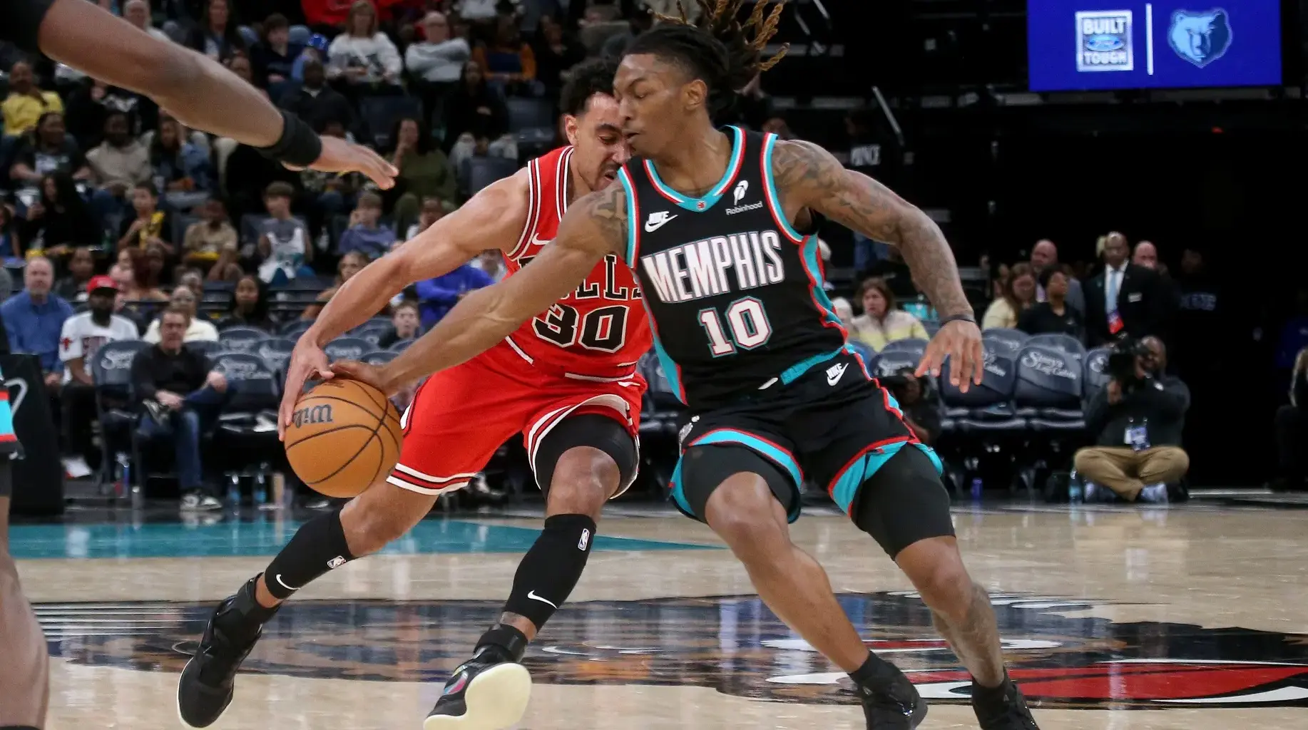 Memphis Grizzlies guard Javon Small (10) steals the ball from Chicago Bulls guard Tre Jones (30) during the third quarter at FedExForum.