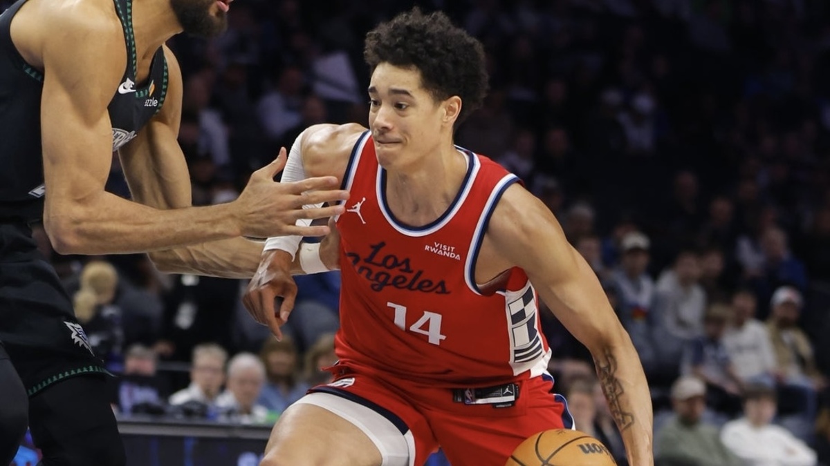 Los Angeles Clippers center Yanic Konan Niederhauser (14) goes to the basket against Minnesota Timberwolves center Rudy Gobert (27) in the fourth quarter at Target Center.