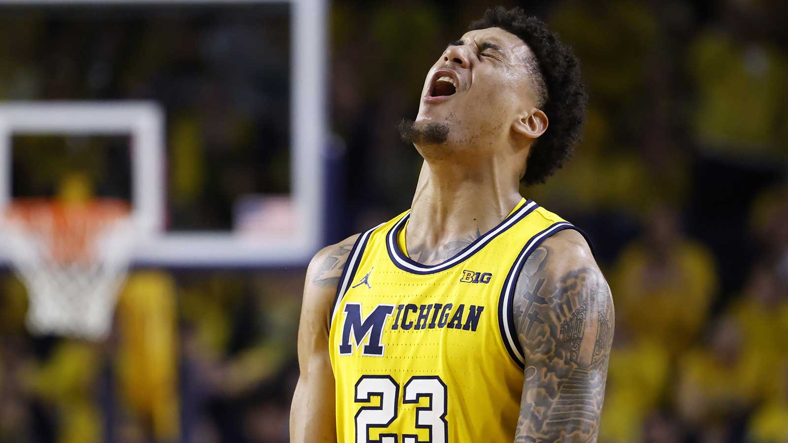 Michigan Wolverines forward Yaxel Lendeborg (23) celebrates in the second half against the Michigan State Spartans at Crisler Center.