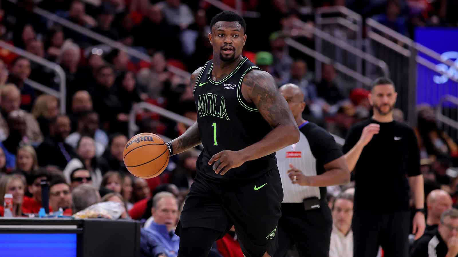 New Orleans Pelicans forward Zion Williamson (1) dribbles against the Houston Rockets during the fourth quarter at Toyota Center.