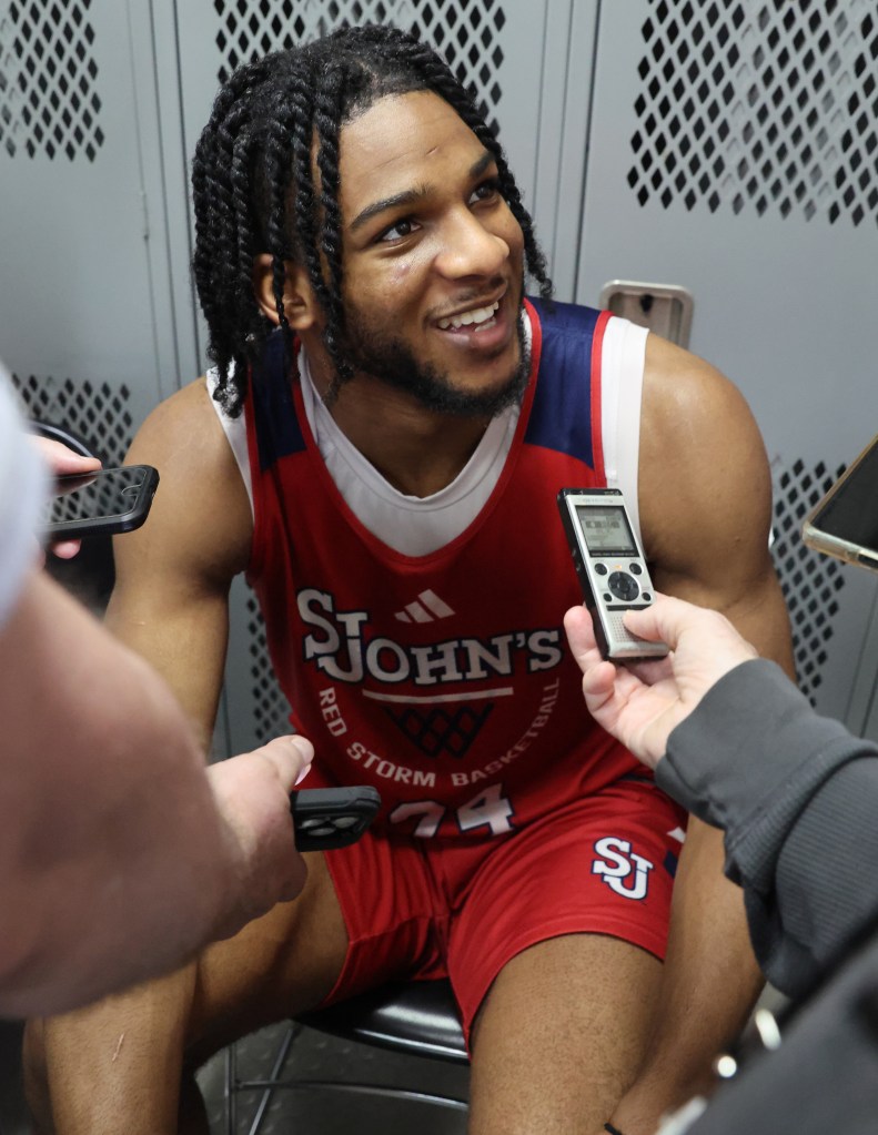 A smiling Zuby Ejiofor talks with the media on March 21, 2026 in preparation for St. John's NCAA Tournament second-round showdown vs. Kansas.