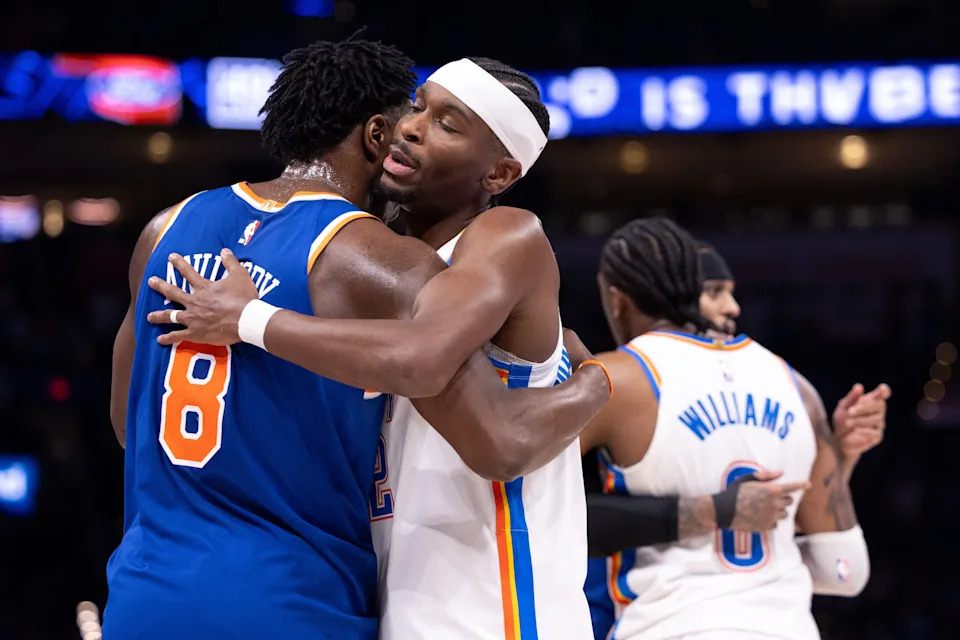 OKLAHOMA CITY, OKLAHOMA - MARCH 29: Shai Gilgeous-Alexander #2 of the Oklahoma City Thunder hugs Og Anunoby #8 of the New York Knicks after the game at Paycom Center on March 29, 2026 in Oklahoma City, Oklahoma. NOTE TO USER: User expressly acknowledges and agrees that, by downloading and or using this photograph, User is consenting to the terms and conditions of the Getty Images License Agreement. (Photo by William Purnell/Getty Images)