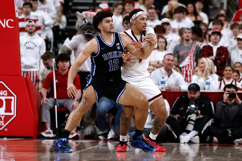 RALEIGH, NORTH CAROLINA – MARCH 2: Darrion Williams #1 of the NC State Wolfpack defends against Cameron Boozer #12 of the Duke Blue Devils at Lenovo Center on March 2, 2026 in Raleigh, North Carolina. (Photo by Lance King/Getty Images) | Getty Images