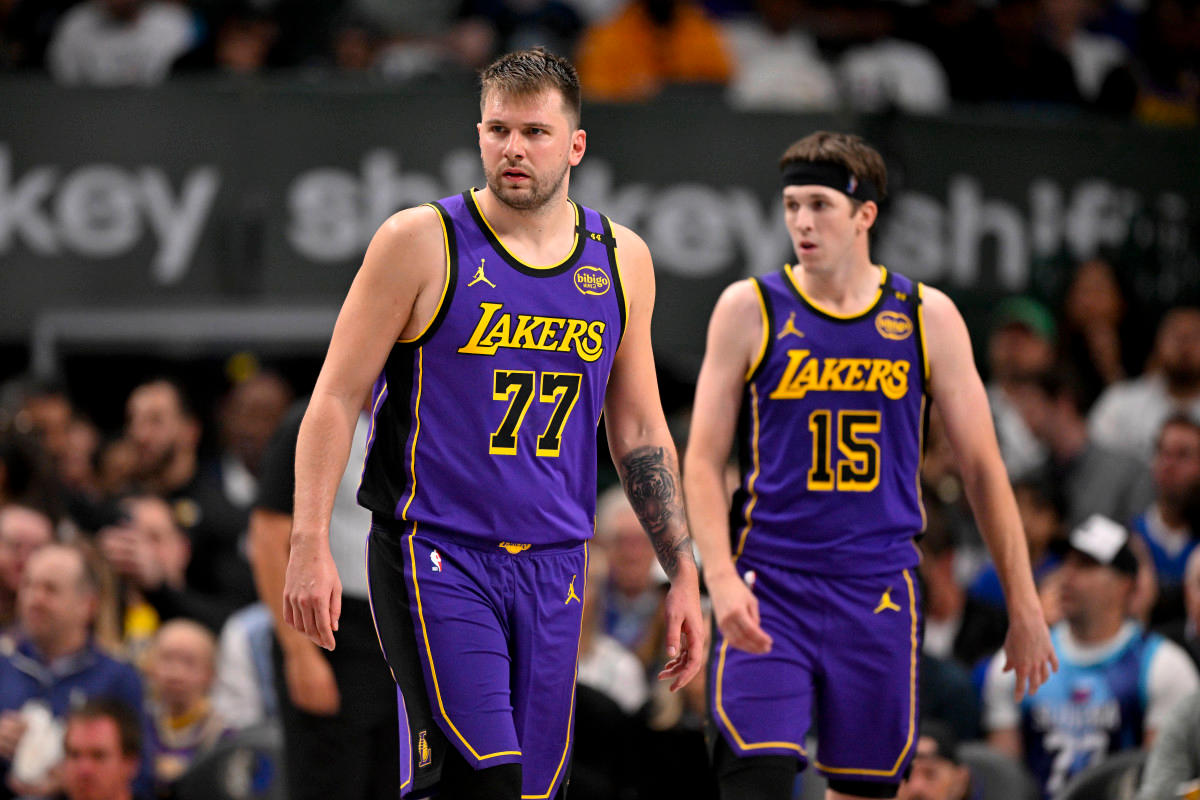 Los Angeles Lakers guard Luka Doncic (77) and guard Austin Reaves (15)© Jerome Miron-Imagn Images