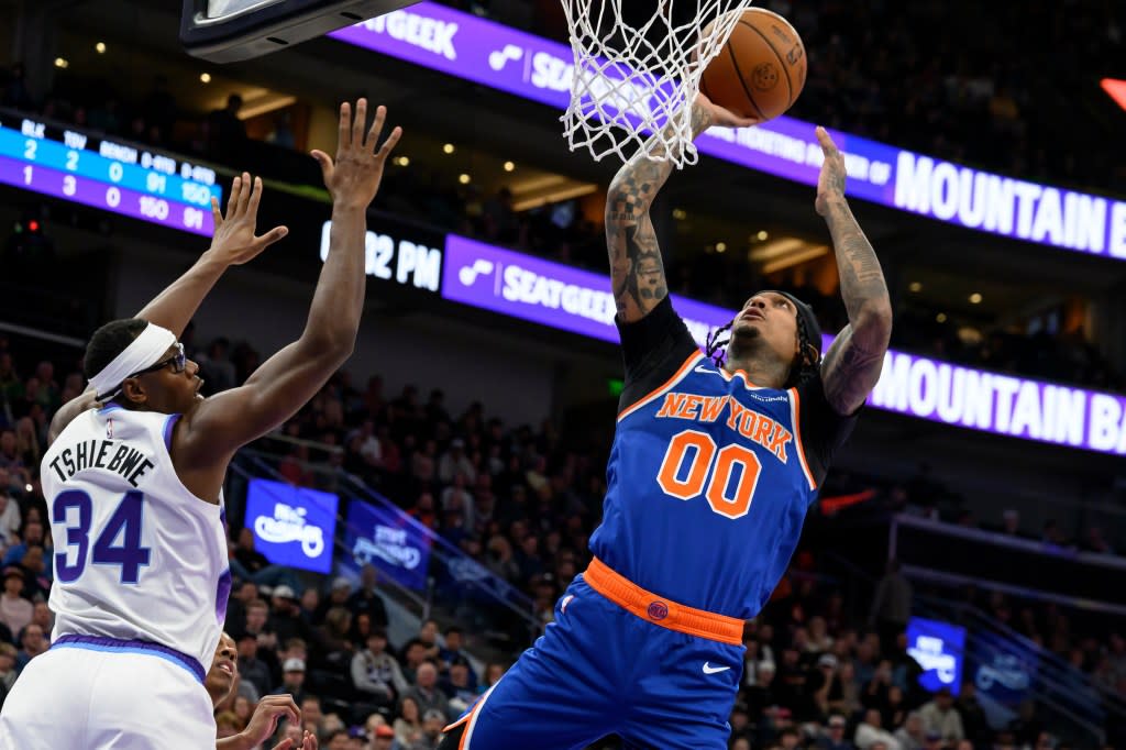 Jordan Clarkson, who scored 27 points off the bench, goes up for a layup as Oscar Tshiebwe defends during the Knicks’ 134-117 win overt the Jazz in Salt Lake City on March 11, 2026. AP