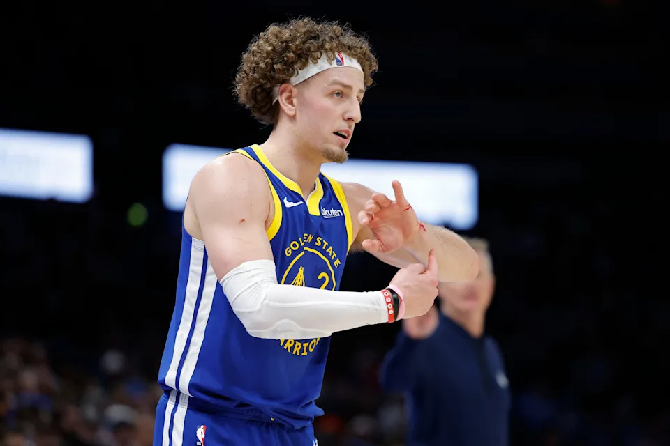 Mar 7, 2026; Oklahoma City, Oklahoma, USA; Golden State Warriors guard Brandin Podziemski (2) points at blood dripping from his wrist for officials to see after a play against the Oklahoma City Thunder during the second half at Paycom Center. Mandatory Credit: Alonzo Adams-Imagn Images