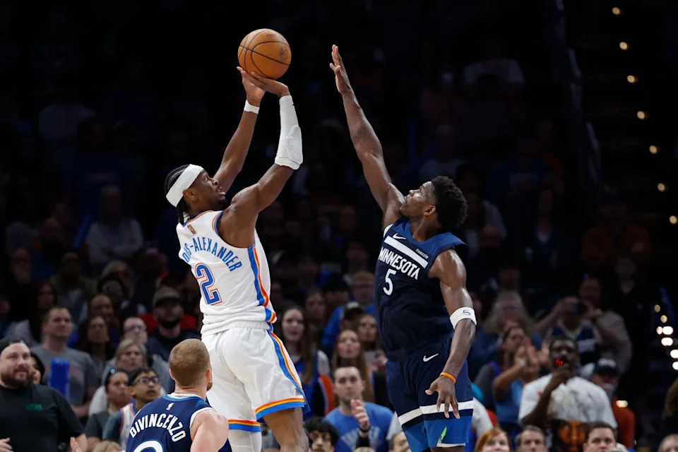 Mar 15, 2026; Oklahoma City, Oklahoma, USA; Oklahoma City Thunder guard Shai Gilgeous-Alexander (2) shoots over Minnesota Timberwolves guard Anthony Edwards (5) during the second half at Paycom Center. Mandatory Credit: Alonzo Adams-Imagn Images