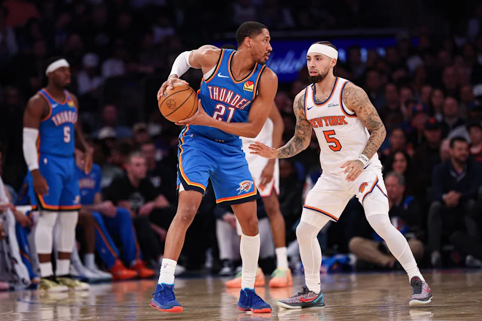 Mar 4, 2026; New York, New York, USA; Oklahoma City Thunder guard Aaron Wiggins (21) shields the ball away from New York Knicks guard Jose Alvarado (5) during the second half at Madison Square Garden. Mandatory Credit: Vincent Carchietta-Imagn Images