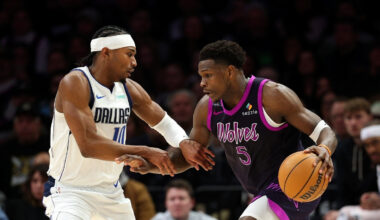 Anthony Edwards (#5) of the Minnesota Timberwolves drives to the basket against Brandon Williams (#10) of the Dallas Mavericks during a game at Target Center in February 2026.