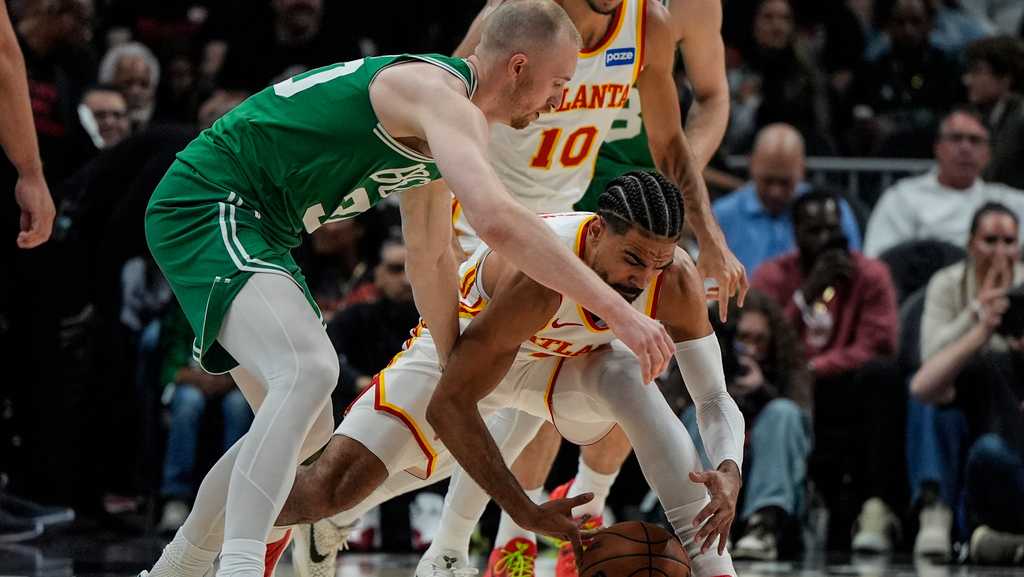 Hawks surge past the Celtics 112-102, riding a big third quarter and a 13th straight home win