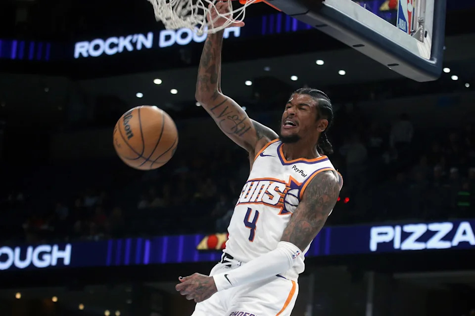 Phoenix Suns guard Jalen Green (4) dunks during the second quarter against the Memphis Grizzlies at FedExForum on March 30, 2026.