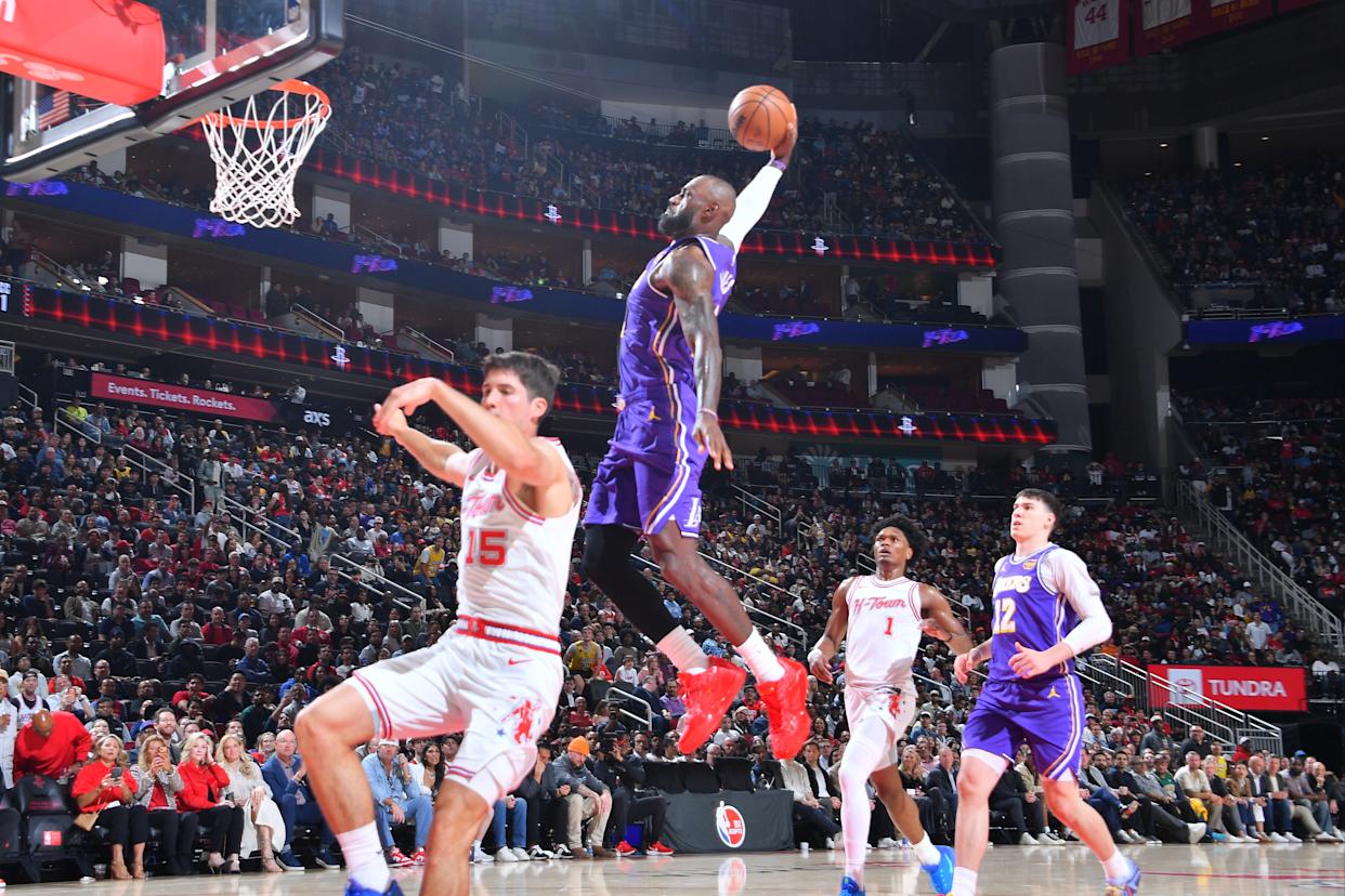 HOUSTON, TX – MARCH 18: LeBron James #23 of the Los Angeles Lakers dunks the ball during the game against the Houston Rockets on March 18, 2026 at the Toyota...