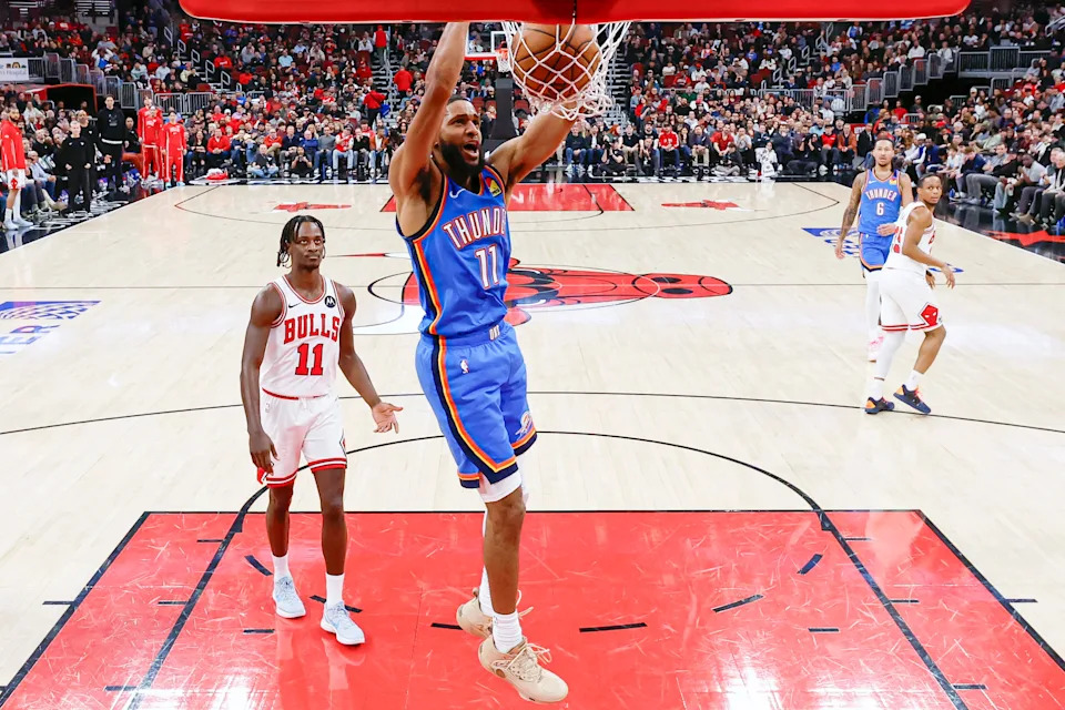 Mar 3, 2026; Chicago, Illinois, USA; Oklahoma City Thunder guard Isaiah Joe (11) dunks the ball against the Chicago Bulls during the second half at United Center. Mandatory Credit: Kamil Krzaczynski-Imagn Images