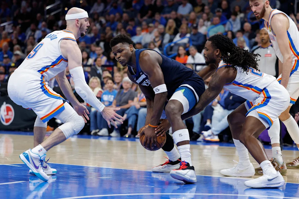 Mar 15, 2026; Oklahoma City, Oklahoma, USA; Oklahoma City Thunder guard Cason Wallace (22) reaches to steal the ball away from Minnesota Timberwolves guard Anthony Edwards (5) during the second half at Paycom Center. Mandatory Credit: Alonzo Adams-Imagn Images