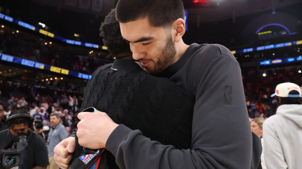 Zach Edey #14 of the Memphis Grizzlies hugs Jaren Jackson Jr. #20 of the Utah Jazz after the game on February 20, 2026 at FedExForum in Memphis, Tennessee. - Joe Murphy/NBAE/Getty Images
