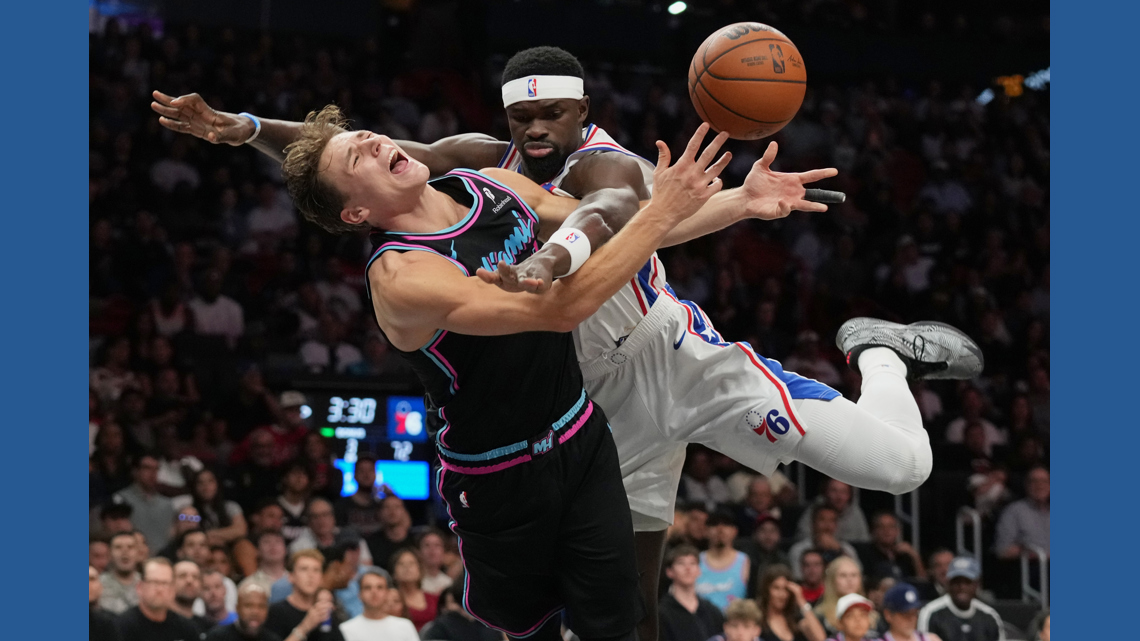 Heat rally late, pull away to beat 76ers