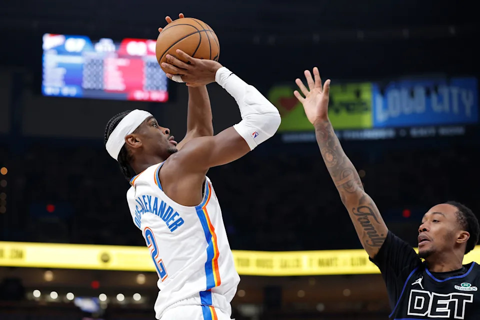 Mar 30, 2026; Oklahoma City, Oklahoma, USA; Oklahoma City Thunder guard Shai Gilgeous-Alexander (2) shoots as Detroit Pistons forward Ronald Holland II (5) defends during the second half at Paycom Center. Mandatory Credit: Alonzo Adams-Imagn Images