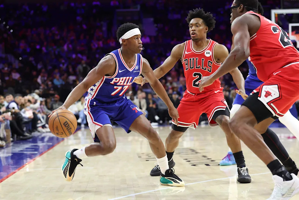 Mar 25, 2026; Philadelphia, Pennsylvania, USA; Philadelphia 76ers guard Vj Edgecombe (77) controls the ball against Chicago Bulls guard Collin Sexton (2) during the first quarter at Xfinity Mobile Arena. Mandatory Credit: Bill Streicher-Imagn Images