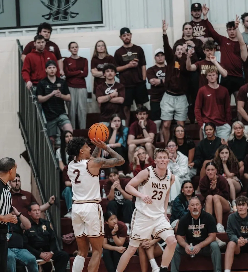 Walsh's Quinn Barnett shoots from the corner during Sunday's NCAA Division II Tournament game against Northern Michigan.