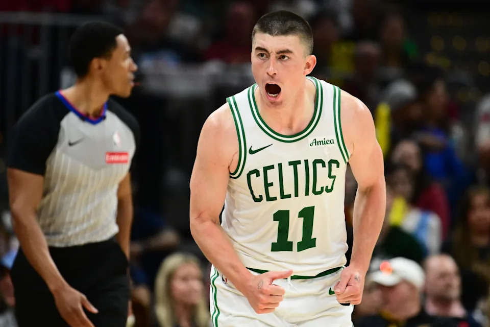Mar 8, 2026; Cleveland, Ohio, USA; Boston Celtics guard Payton Pritchard (11) celebrates after hitting a three point basket against the Cleveland Cavaliers during the second half at Rocket Arena. Mandatory Credit: Ken Blaze-Imagn Images