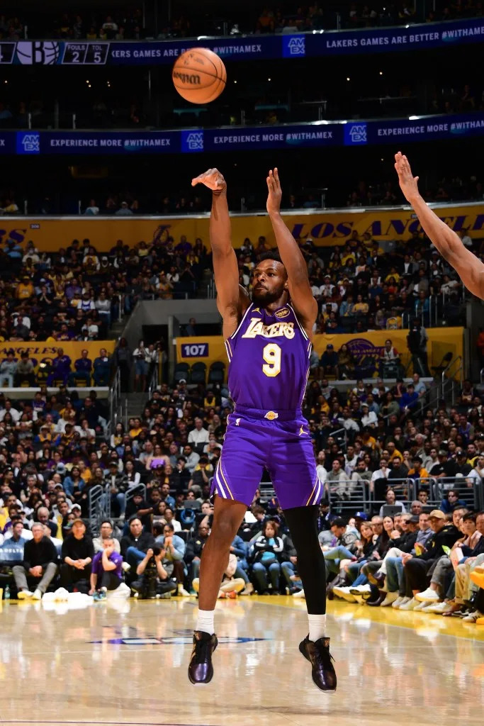 Bronny James of the Los Angeles Lakers shoots a three point basket during the game against the Brooklyn Nets on March 27, 2026 at Crypto.Com Arena in Los Angeles, California. (Photo by Adam Pantozzi/NBAE via Getty Images) NBAE via Getty Images