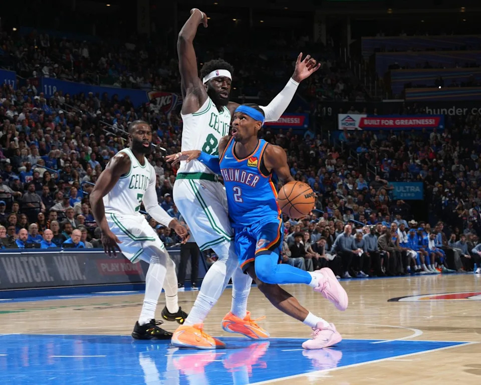 Shai Gilgeous-Alexander #2 of the Oklahoma City Thunder drives to the basket during the game against the Boston Celtics. NBAE via Getty Images