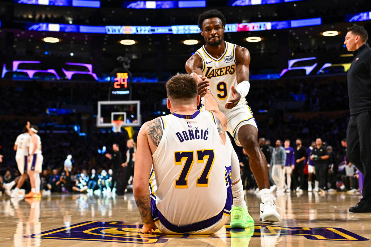 Los Angeles Lakers guard Bronny James (9) helps guard Luka Doncic (77).Jonathan Hui-Imagn Images