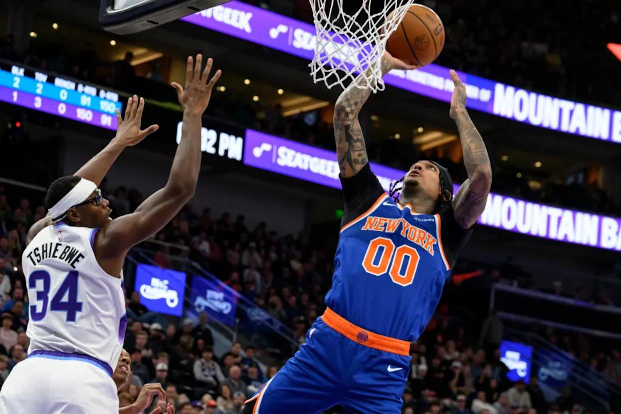 An image collage containing 1 images, Image 1 shows Jordan Clarkson, who scored 27 points off the bench, goes up for a layup as Oscar Tshiebwe defends during the Knicks' 134-117 win overt the Jazz in Salt Lake City on March 11, 2026
