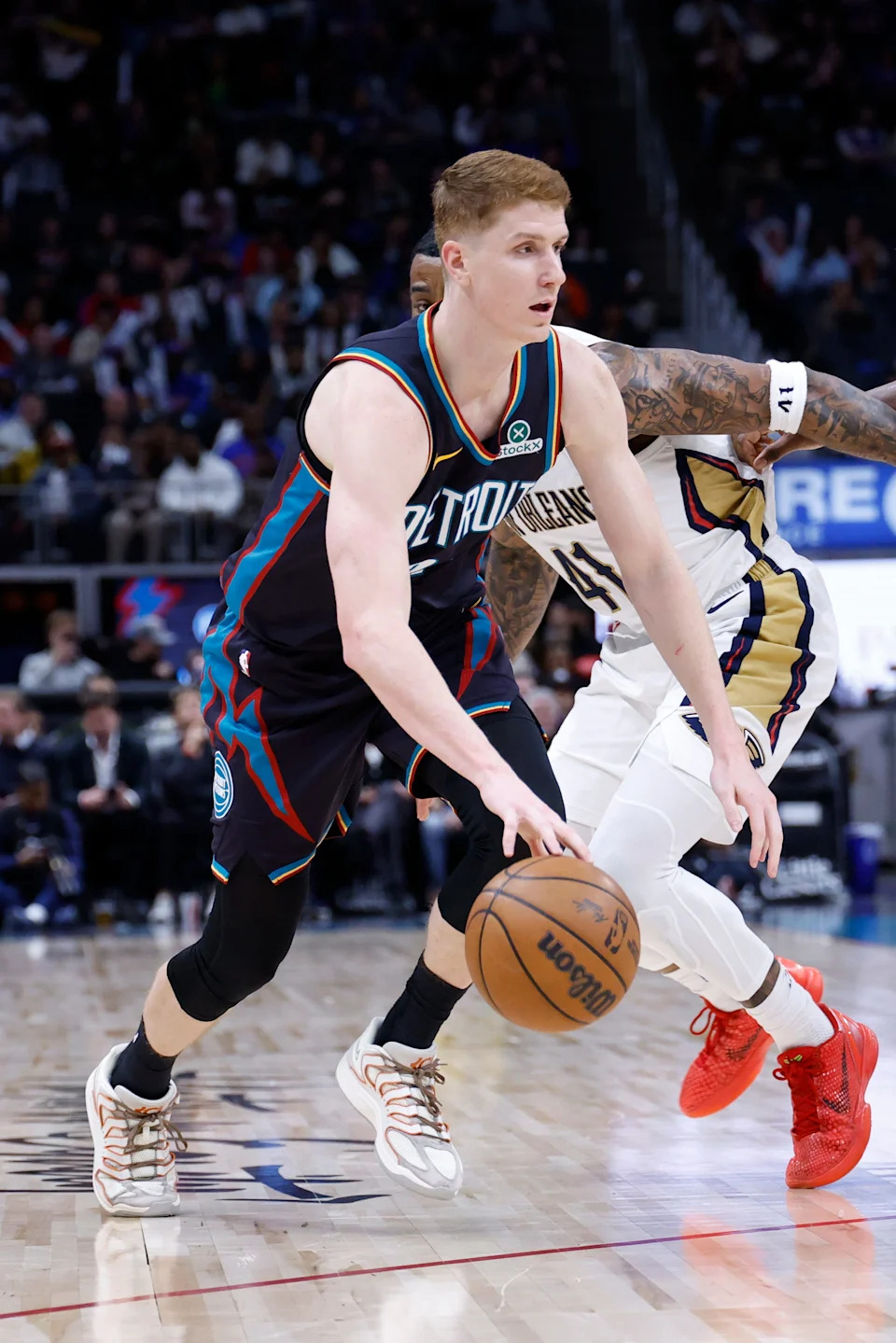 Detroit Pistons guard Kevin Huerter (27) dribbles in the second half against the New Orleans Pelicans at Little Caesars Arena in Detroit on Thursday, March 26, 2026.