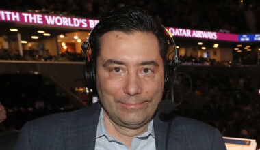 Close-up of Chris Carrino wearing a headset in Barclays Center