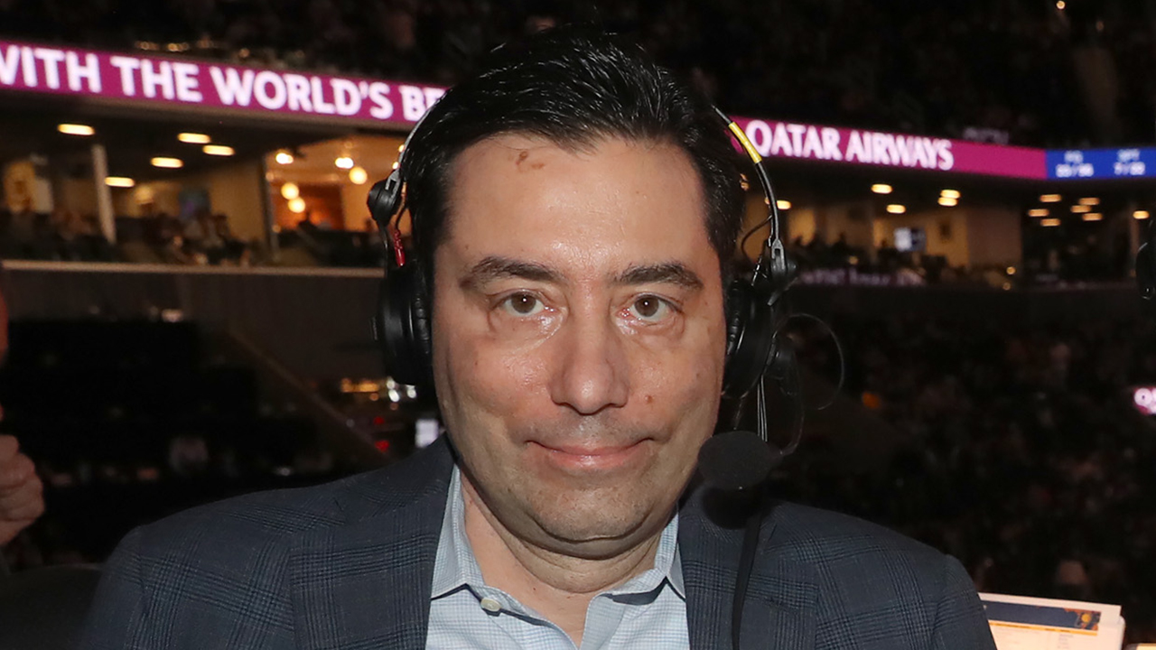 Close-up of Chris Carrino wearing a headset in Barclays Center