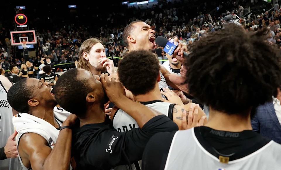 San Antonio Spurs forward Victor Wembanyama (1) yells into the microphone after a win at Frost Bank Center in San Antonio, Thursday, March 19, 2026. The Spurs won in the last second, 101-100. (Andrew J. Whitaker/San Antonio Express-News)