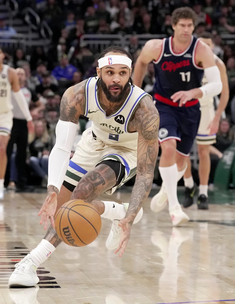 Milwaukee Bucks guard Gary Trent Jr. (5) grabs a loose ball during the first half of their game against the LA Clippers Sunday, March 29, 2026 at Fiserv Forum in Milwaukee, Wisconsin.