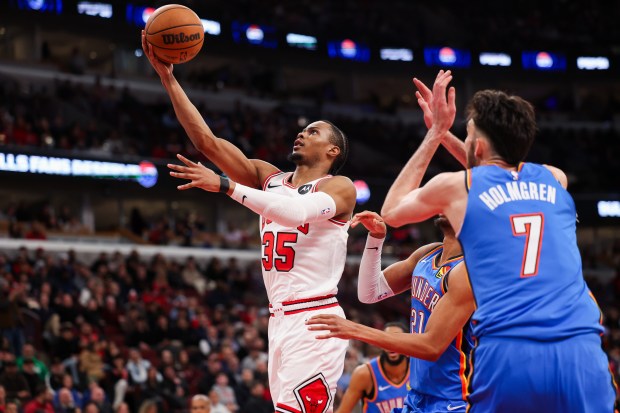 Chicago Bulls forward Isaac Okoro (35) goes up for a basket during the first quarter against the Oklahoma City Thunder at the United Center March 3, 2026 in Chicago. (Armando L. Sanchez/Chicago Tribune)