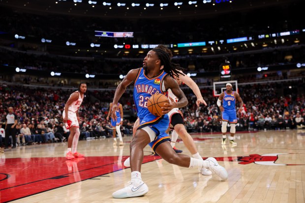 Oklahoma City Thunder guard Cason Wallace (22) drives past Chicago Bulls guard Josh Giddey (3) during the third quarter at the United Center March 3, 2026 in Chicago. (Armando L. Sanchez/Chicago Tribune)