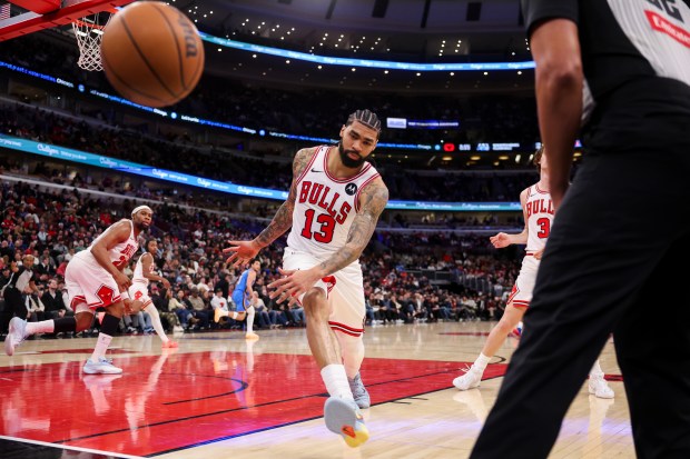 Chicago Bulls center Nick Richards (13) chases a ball out-of-bounds during the fourth quarter against the Oklahoma City Thunder at the United Center March 3, 2026 in Chicago. (Armando L. Sanchez/Chicago Tribune)