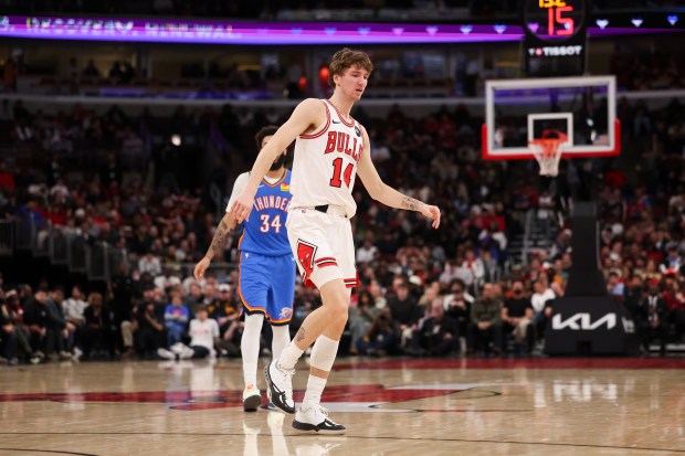 Chicago Bulls forward Matas Buzelis (14) walks off the court before going to the locker room after falling on the court during the third quarter against the Oklahoma City Thunder at the United Center March 3, 2026 in Chicago. (Armando L. Sanchez/Chicago Tribune)