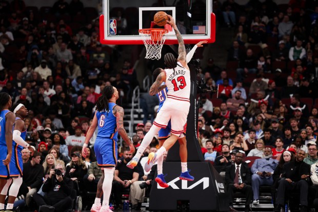 Chicago Bulls center Nick Richards (13) dunks the ball during the fourth quarter against the Oklahoma City Thunder at the United Center March 3, 2026 in Chicago. (Armando L. Sanchez/Chicago Tribune)