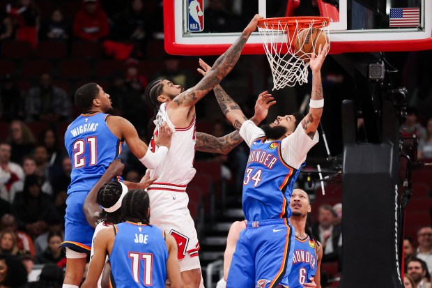 Chicago Bulls center Nick Richards (13) dunks the ball during the fourth quarter against the Oklahoma City Thunder at the United Center March 3, 2026 in Chicago. (Armando L. Sanchez/Chicago Tribune)