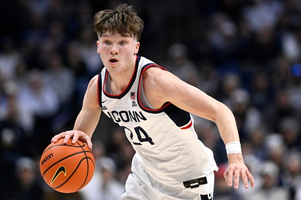 UConn guard Braylon Mullins in the first half of a game against Seton Hall, Saturday, Feb. 28, 2026, in Storrs, Conn. (AP Photo/Jessica Hill)