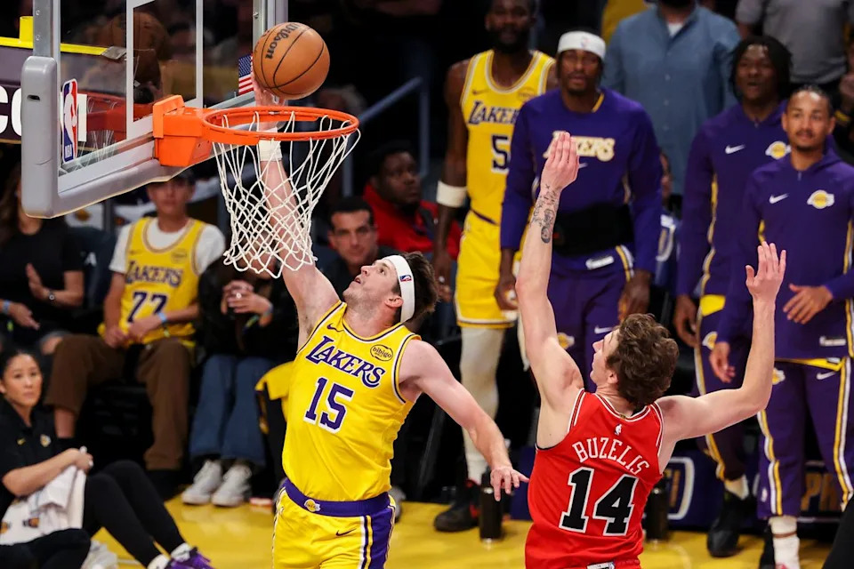 Austin Reaves #15 of the Los Angeles Lakers lays the ball up during an NBA basketball game against the Chicago Bulls, Thursday March 12, 2026 in Los Angeles, Calif.