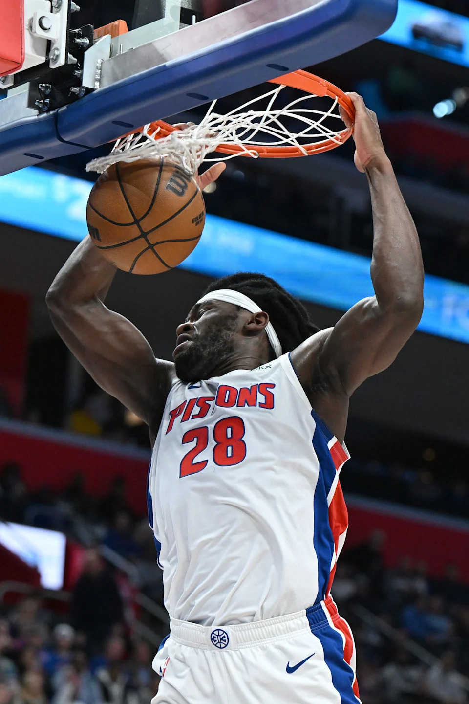 Detroit Pistons forward Isaiah Stewart (28) dunks the ball against the Philadelphia 76ers in the first half at Little Caesars Arena in Detroit on Thursday, March 12, 2026.