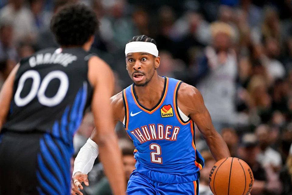 Mar 1, 2026; Dallas, Texas, USA; Oklahoma City Thunder guard Shai Gilgeous-Alexander (2) brings the ball up court past Dallas Mavericks guard Max Christie (00) during the second half at the American Airlines Center. Mandatory Credit: Jerome Miron-Imagn Images